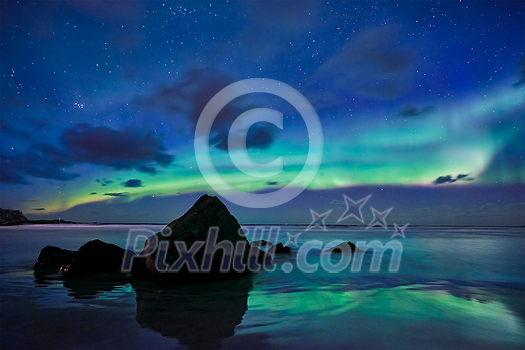 Aurora borealis northern lights on Skagsanden beach. Lofoten Islands, Norway Aurora borealis northern lights on Skagsanden beach. Lofoten Islands, Norway