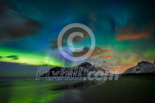 Aurora borealis northern lights on Skagsanden beach. Lofoten Islands, Norway Aurora borealis northern lights on Skagsanden beach. Lofoten Islands, Norway