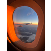 Splendid sunrise as seen through an airplane window somewhere above Sweden