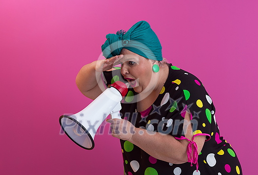Funny plus size woman woman posing isolated on pink background studio portrait. People emotions lifestyle concept. Mock up copy space. Screaming in megaphone. High quality photo Funny plus size woman woman posing isolated on pink background studio portrait. People emotions lifestyle concept. Mock up copy space. Screaming in megaphone. High quality photo
