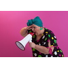 Funny plus size woman woman posing isolated on pink background studio portrait. People emotions lifestyle concept. Mock up copy space. Screaming in megaphone. High quality photo