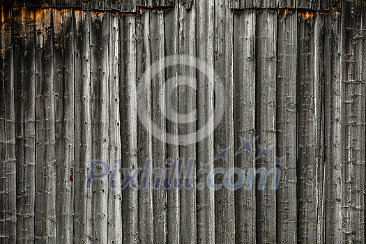 Wooden texture - mountain chalet wall in Swiss Alps Wooden texture - mountain chalet wall in Swiss Alps