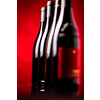 Bottles of quality red wines shot with shallow DOF; color toned image