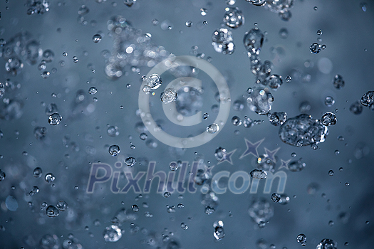 Water concept - river water flowing with light reflecting of its surface - long exposure shot