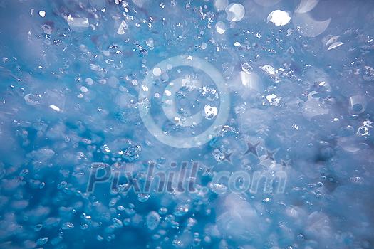 Beautiful water waves - Splashed water wave in clean blue water, clean filtered water ready for drinking Beautiful water waves - Splashed water wave in clean blue water, clean filtered water ready for drinking