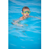 Cute little boy in a swimming pool