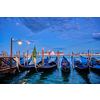 Romantic vacation Venice travel background - gondolas in lagoon of Venice by San Marco square with Basilica San Giorgio Maggiore Church seen across the Venice lagoon with full moon. Venice, Italy