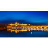 View of famous torist attraction destination - Charles Bridge (Karluv most) and Prague Castle (Prazsky hrad) in twilight. Prague, Czech Republic. Stitched panorama