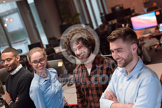Portrait of a successful creative business team looking at camera and smiling. Diverse businesspeople standing together at startup. Selective focus. High-quality photo Portrait of a successful creative business team looking at camera and smiling. Diverse businesspeople standing together at startup. Selective focus. High-quality photo