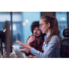  Smiling businesswoman experienced in work on business project training coaching man coworker, pleasant lady qualified consultant advisor assisting male client customer at the laptop. High-quality photo