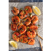 Large grilled BBQ shrimp with sweet chili sauce, green onion and lemon