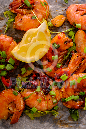 Large grilled BBQ shrimp with sweet chili sauce, green onion and lemon Large grilled BBQ shrimp with sweet chili sauce, green onion and lemon