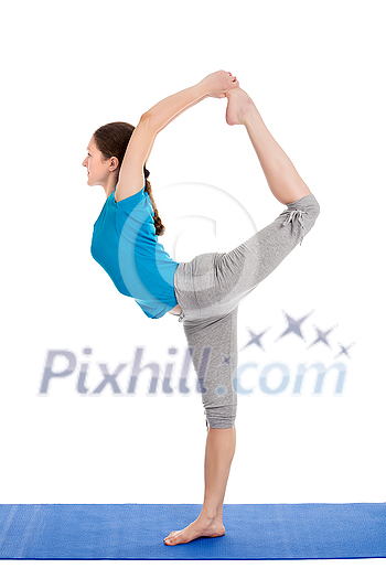 Yoga - young beautiful slender woman yoga instructor doing Lord of the Dance Pose (Natarajasana) asana in ashtanga vinyasa style exercise isolated on white background