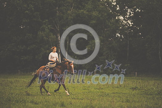 Pretty, young, redhead woman with her lovely horse, during her favorite leisure Pretty, young, redhead woman with her lovely horse, during her favorite leisure