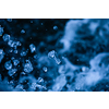 Water concept - river water flowing with light reflecting of its surface - long exposure shot