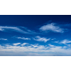 Blue clear sky with white cirrus spindrift clouds background