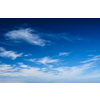 Blue clear sky with white cirrus spindrift clouds background
