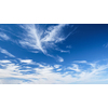 Blue clear sky with white cirrus spindrift clouds background