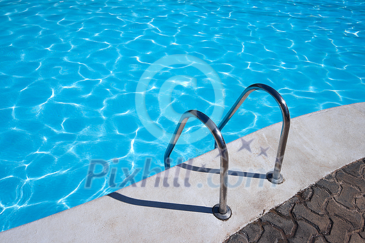 Metal ladder to swimming pool