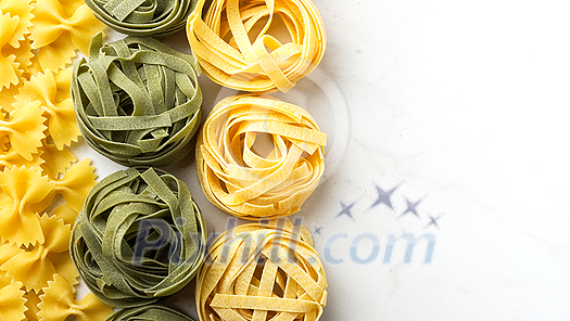 Different types of raw pasta, copyspace. Different types of raw pasta, copyspace.