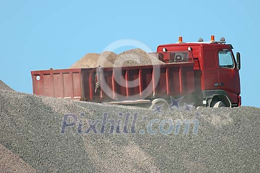 Truck with a pebbles load Truck with a pebbles load