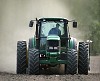 Man driving a tractor on the field